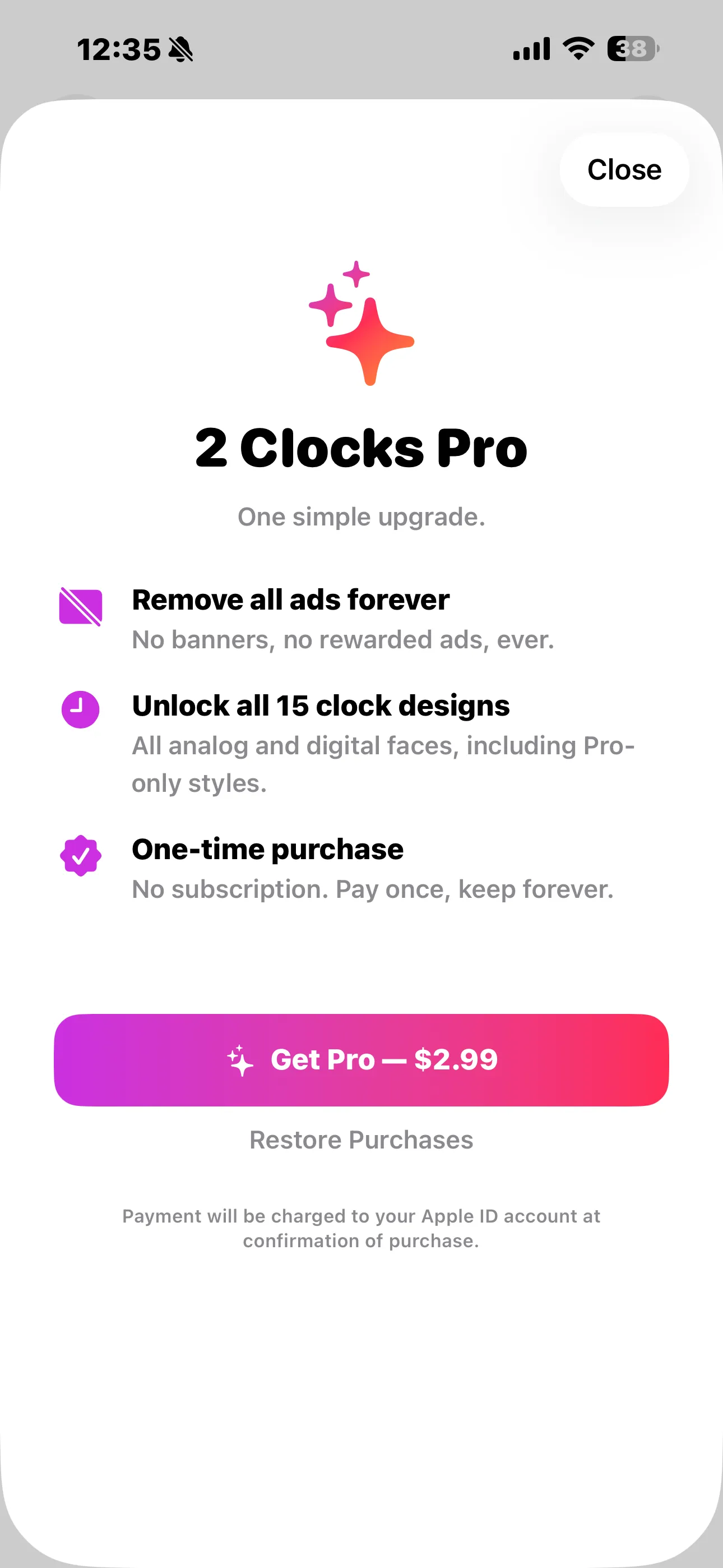 2 Clocks Pro paywall on iPhone with $2.99 one-time purchase and Restore Purchases