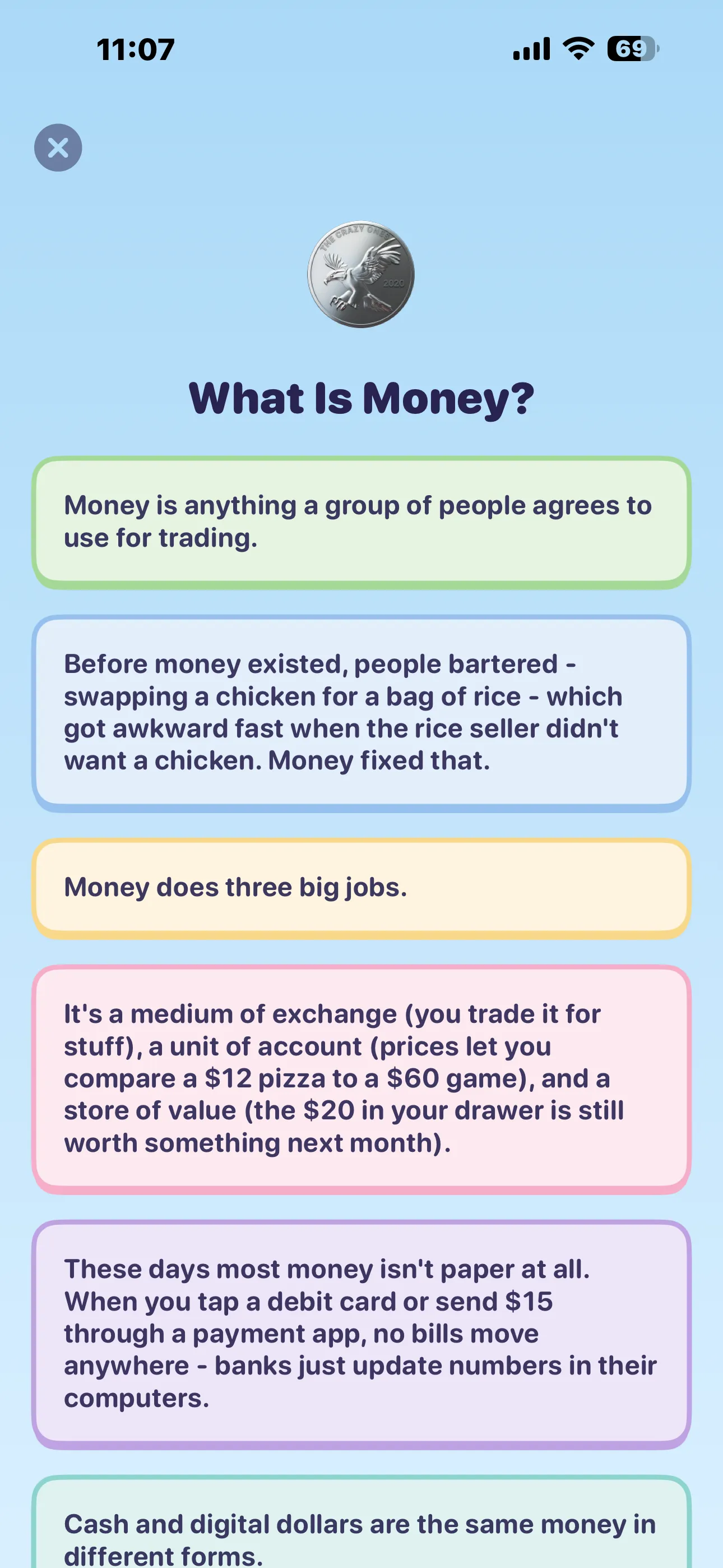 What Is Money lesson — short colour-coded cards explaining money in plain English