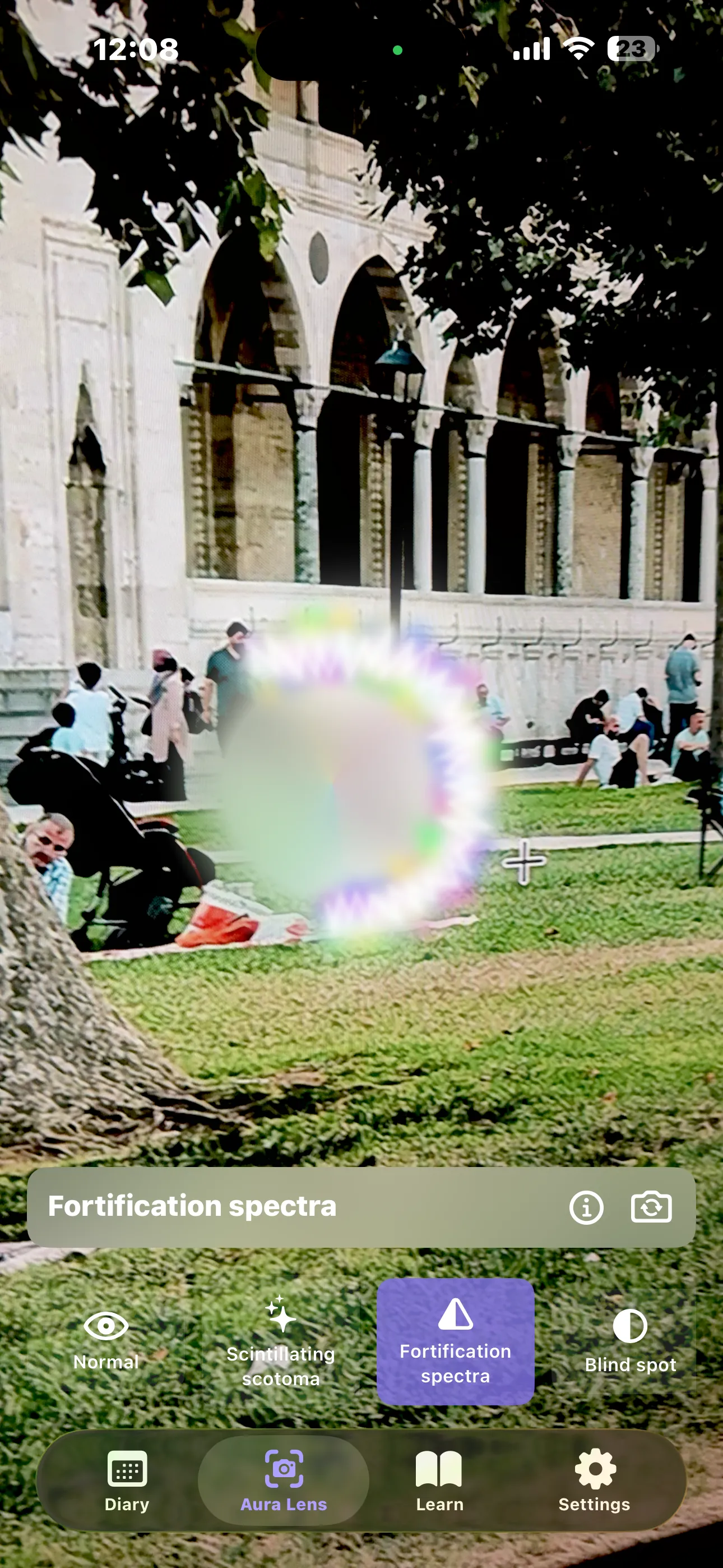 Aura Lens simulating fortification spectra — an expanding coloured zigzag ring over the camera view