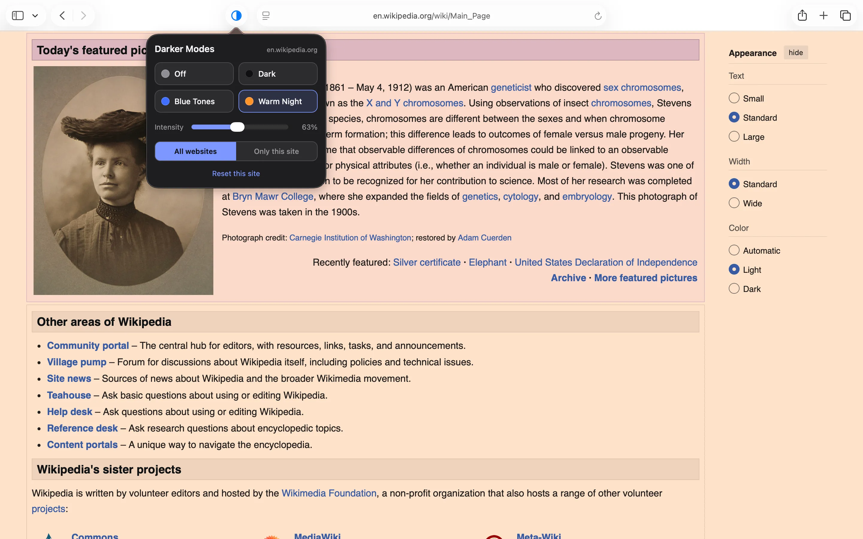 Darker Modes popup showing Warm Night applied to Wikipedia with a warm amber overlay