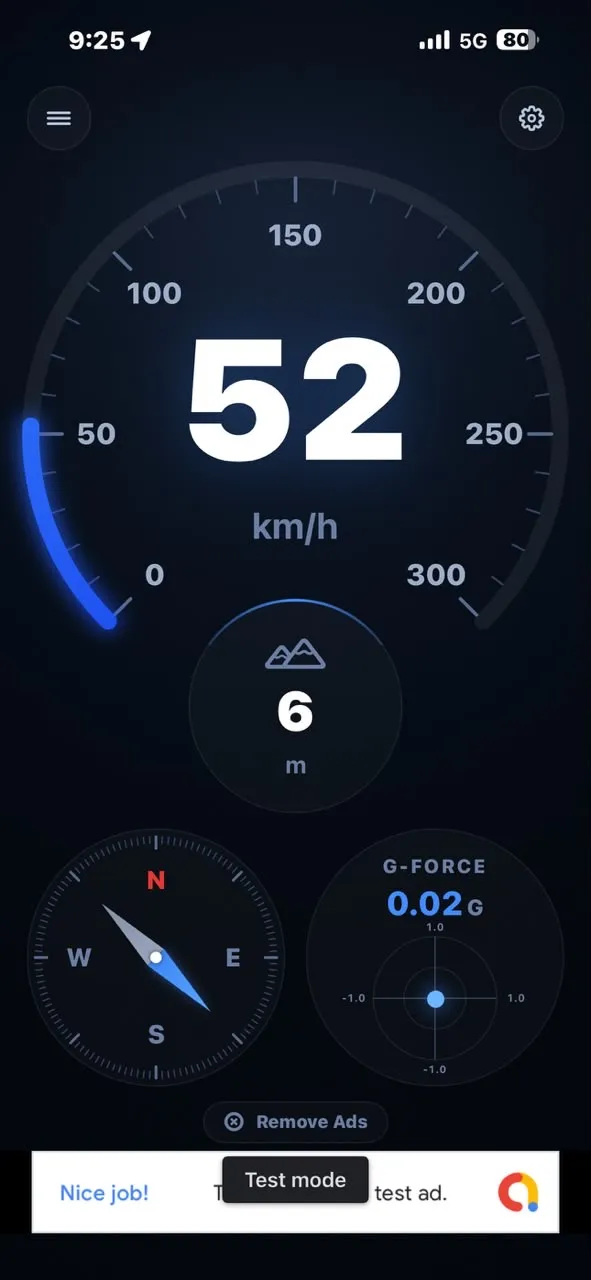 Large speedometer dial reading 52 km/h with altitude, compass and G-force gauges